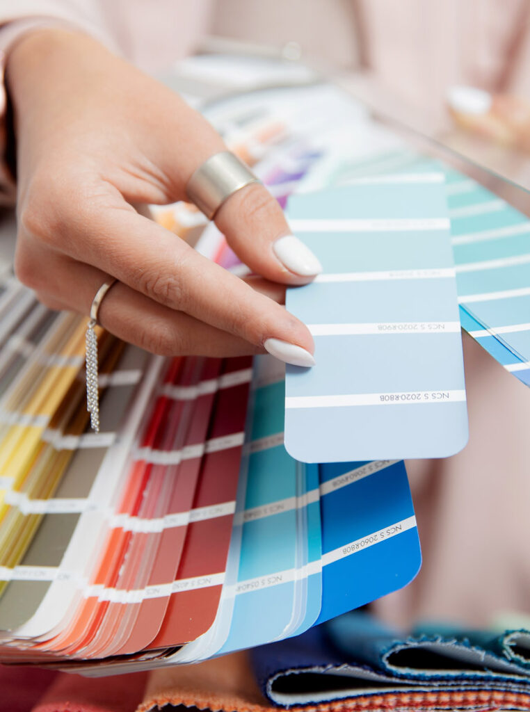 Color consultant choosing blue paint shades for Ottawa home interior