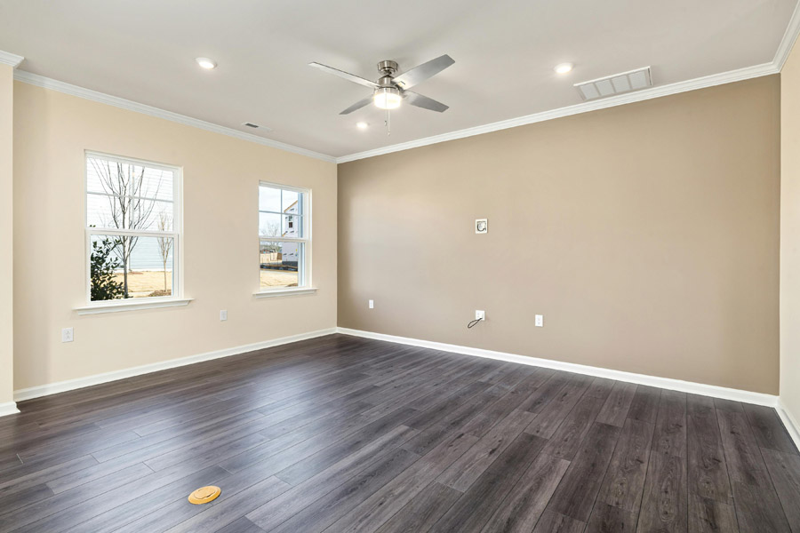 Freshly painted beige living room interior after professional color consultation