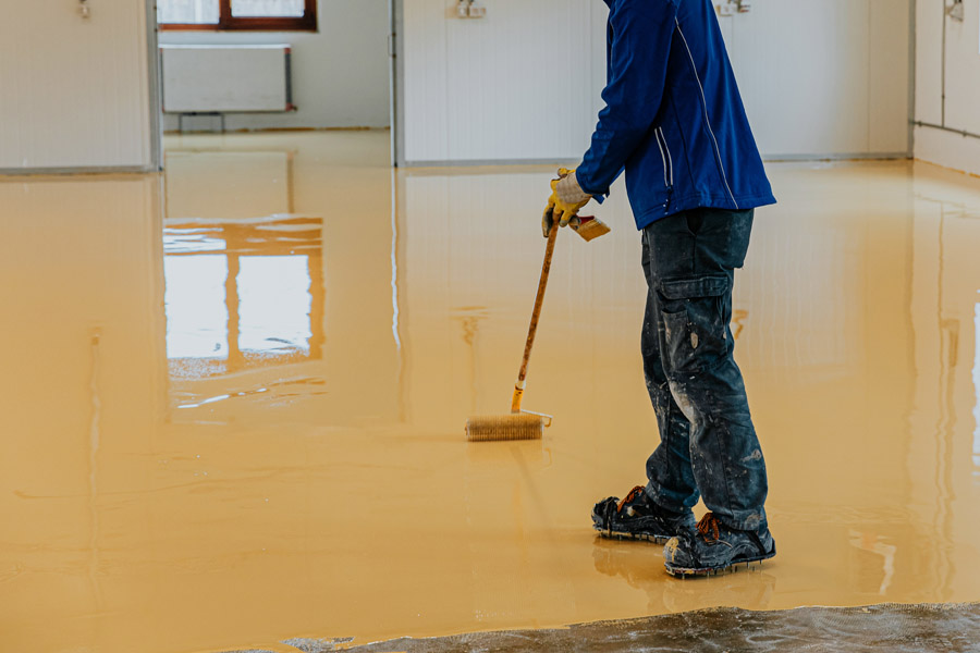 Epoxy floor coating Toronto — yellow resin floor applied by Walls Master