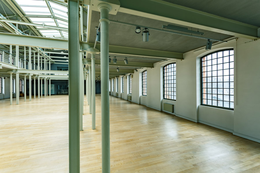 Industrial interior painting Toronto — factory pillars and walls coated by Walls Master